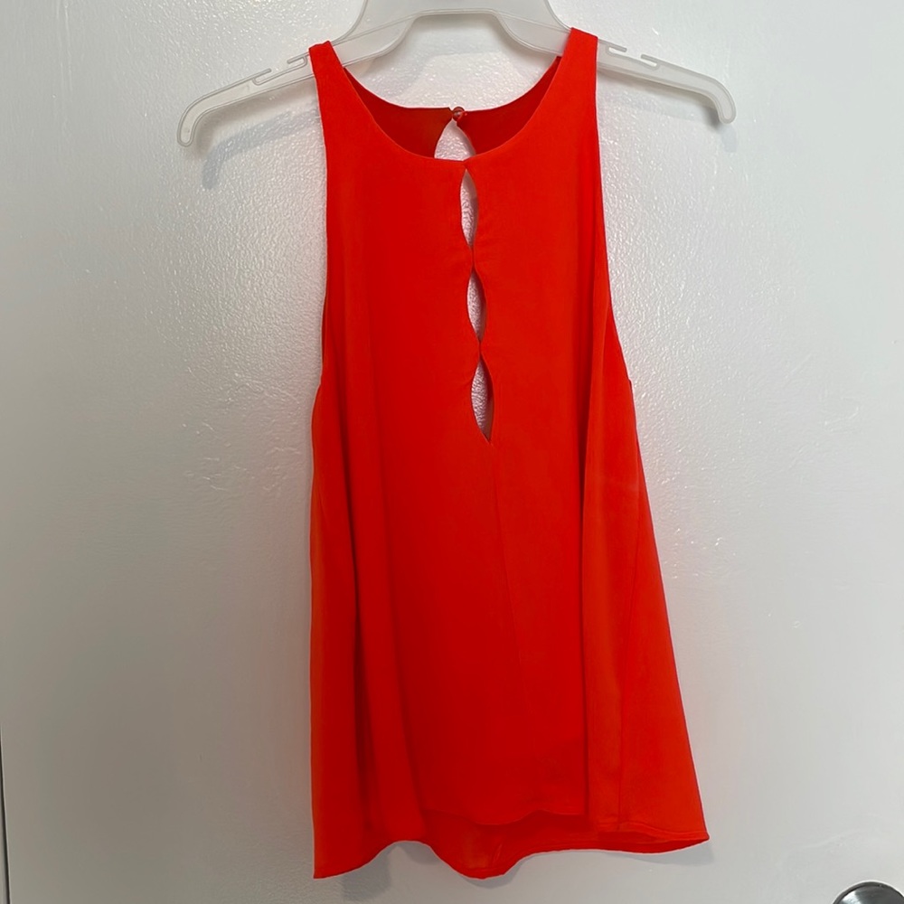Orange sleeveless top key hole design